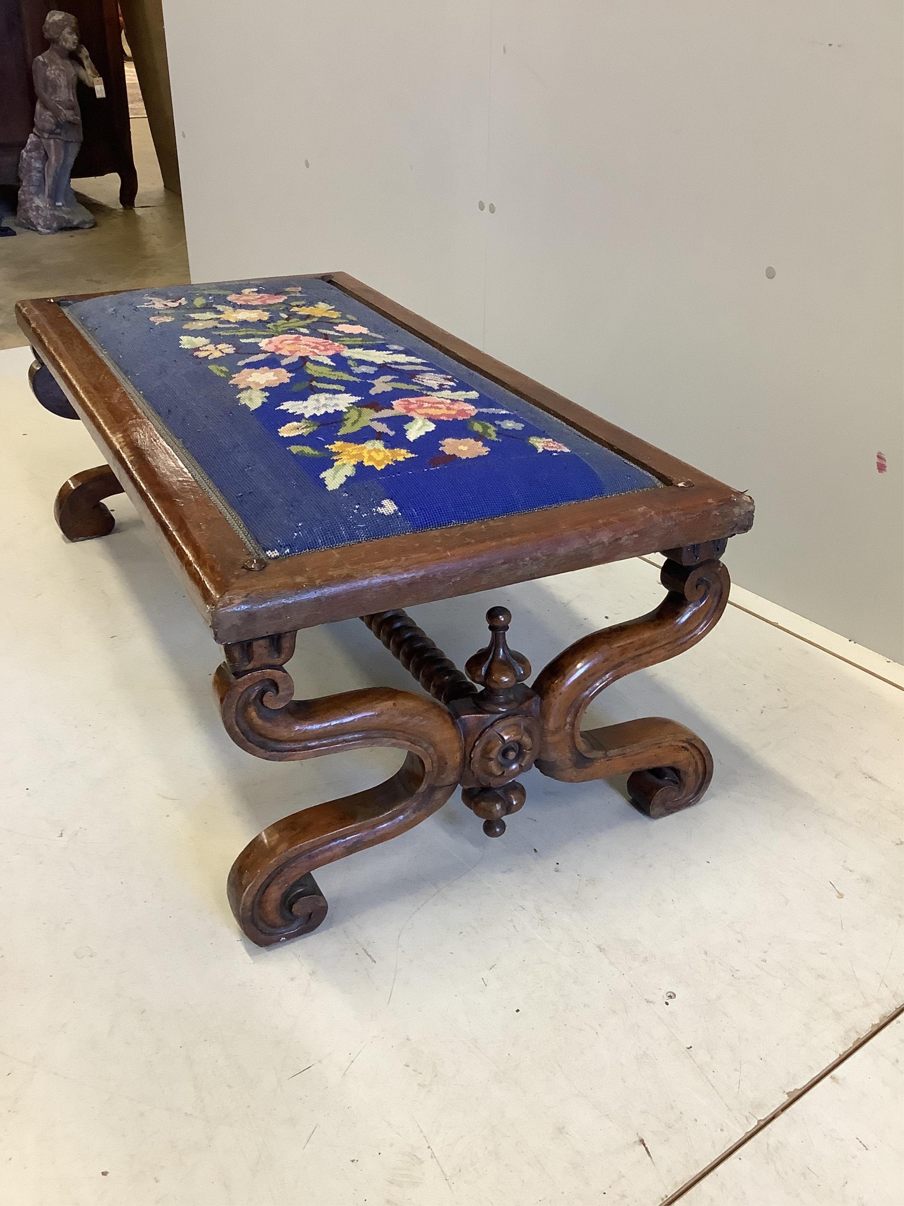 A Victorian mahogany X framed petit-point stool, width 52cm, depth 51cm, height 36cm. Condition - poor